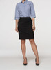 A knee-length black skirt worn with a blue checkered shirt and heels, featuring a simple design and fitted silhouette.
