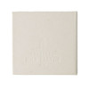 A square note block made from recycled materials, featuring a light cream colour and a subtle texture. It has a logo.