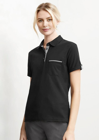 A women's short sleeve polo shirt in black with a grey collar and a pocket, featuring a logo.
