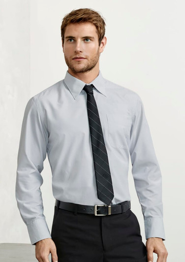 A light grey long sleeve button-up shirt with a pocket, worn with a black tie and trousers. It features a logo.