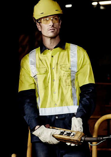 A men’s long sleeve work shirt featuring yellow and navy colours, with shoulder tape and a logo.