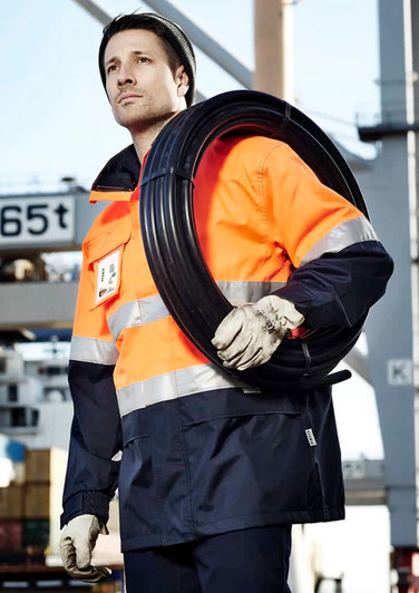 Men's hi-vis ultralite waterproof jacket in orange and navy, featuring reflective stripes and a logo. Model holds a coil of cable.