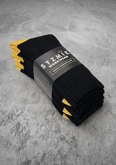 A pack of three black work socks with yellow accents, packaged and branded.
