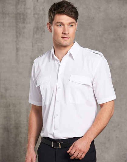 A white button-up shirt with short sleeves, featuring two front pockets and shoulder epaulettes.