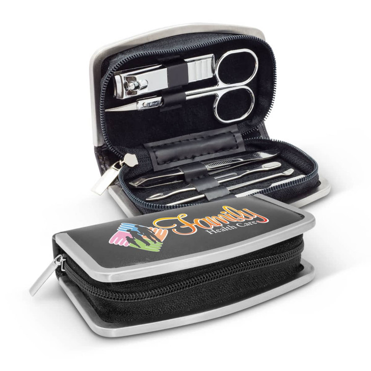 A manicure set in a black and silver case, featuring nail clippers, scissors, and grooming tools, with a logo printed on the front.