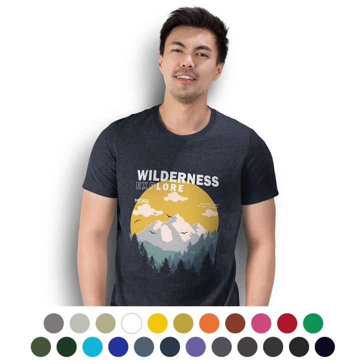 A man wearing a navy T-shirt featuring a mountain and sunset graphic. The shirt has a logo and comes in multiple colours.