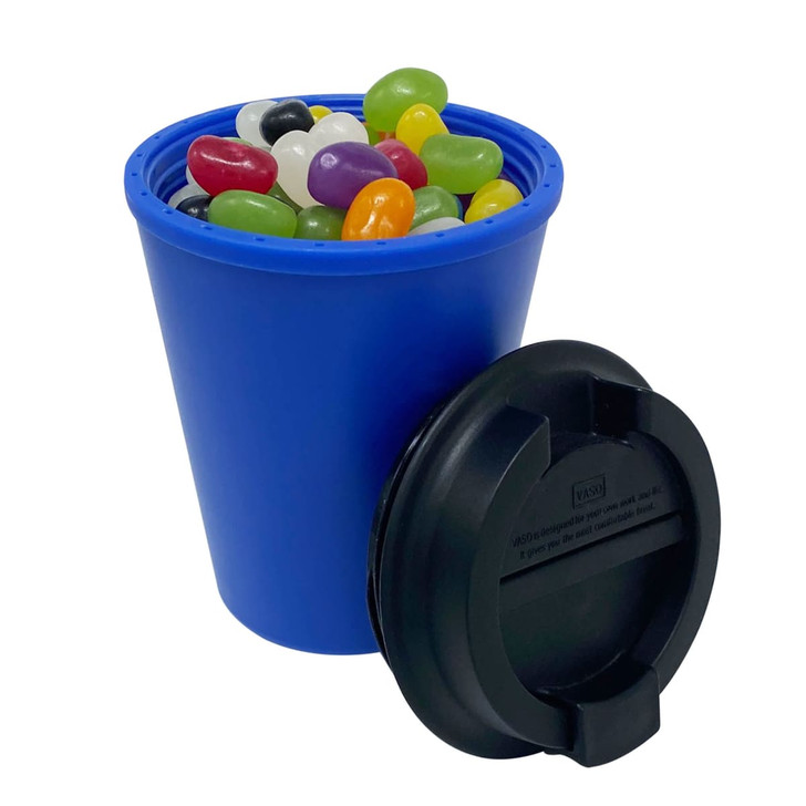 A drink bottle in blue, featuring a black lid, filled with colourful jelly beans.