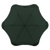 A green BLUNT Metro Umbrella featuring a sleek, rounded design and a central button for closure.