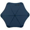 A navy blue BLUNT Coupe Umbrella with a unique star-shaped canopy design and a logo on the handle.