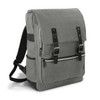 A grey backpack with a flap closure, zippers, and black accents, featuring straps and a branding logo.