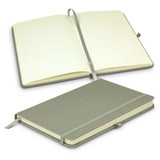 A green notebook with lined pages, featuring a ribbon bookmark and an elastic band closure.