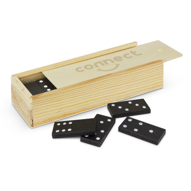 A wooden box containing black dominoes, some laid out beside it, with a logo on the lid.
