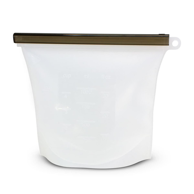 A white silicone reusable storage pouch with a bronze zip closure, featuring measurement markings.