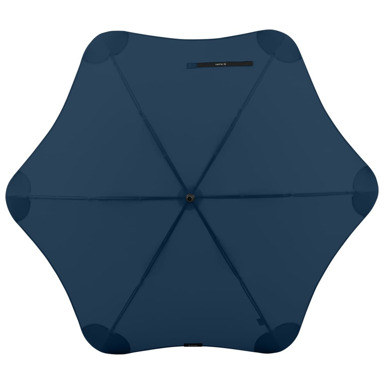 A navy blue BLUNT Coupe Umbrella with a unique star-shaped canopy design and a logo on the handle.
