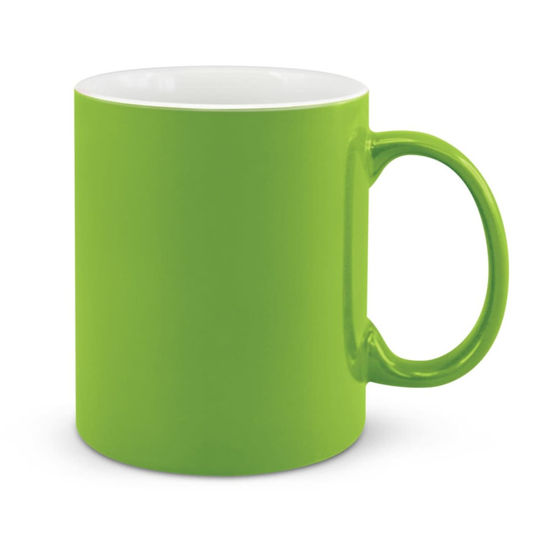 A green ceramic coffee mug with a glossy finish and a standard handle.