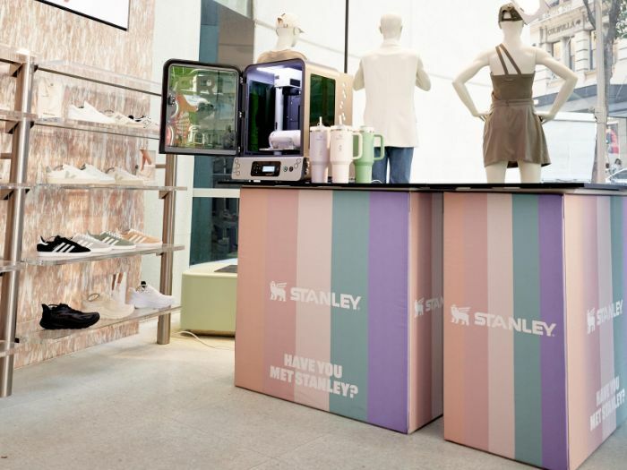 Stylerunner brand activation set up in store to personalise Stanley cups.