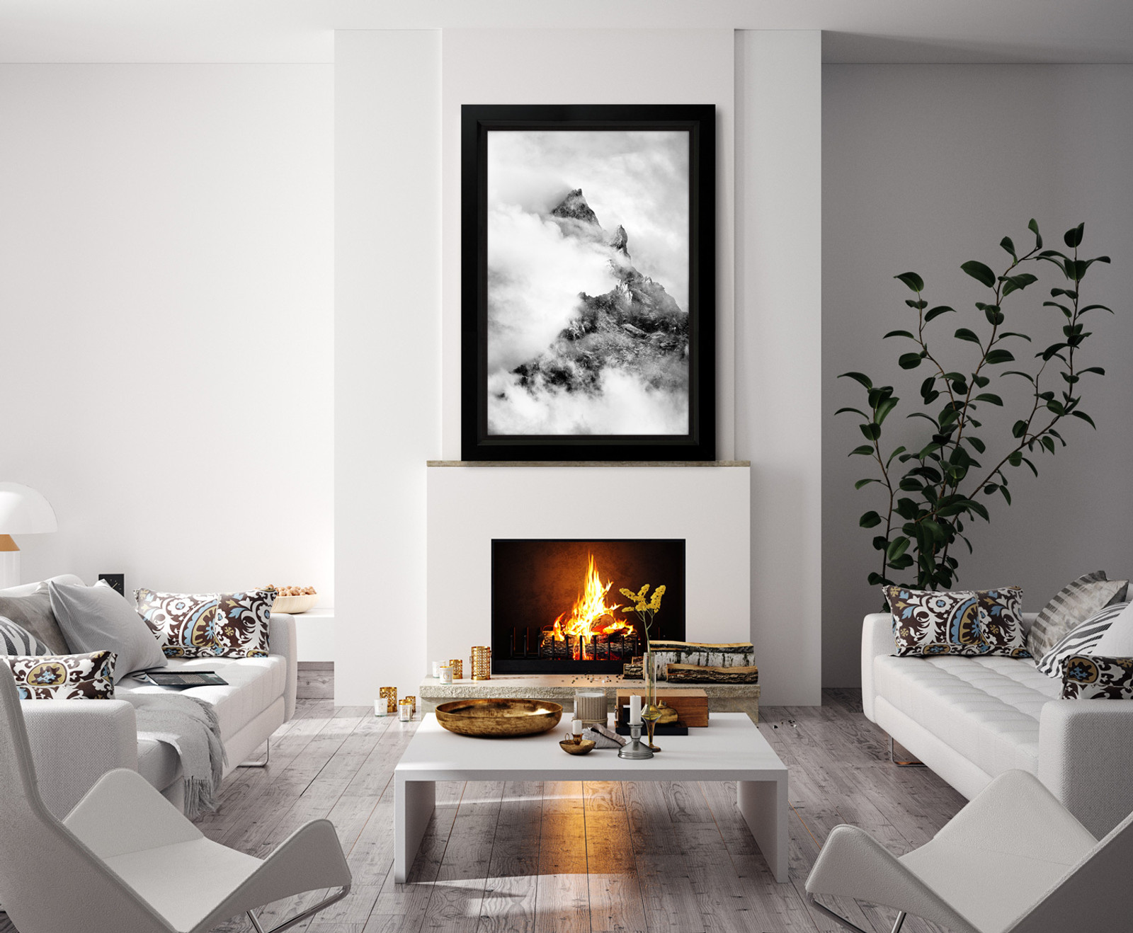 Black and white fine art print of Teewinot Peak displayed over a fireplace in a modern living room