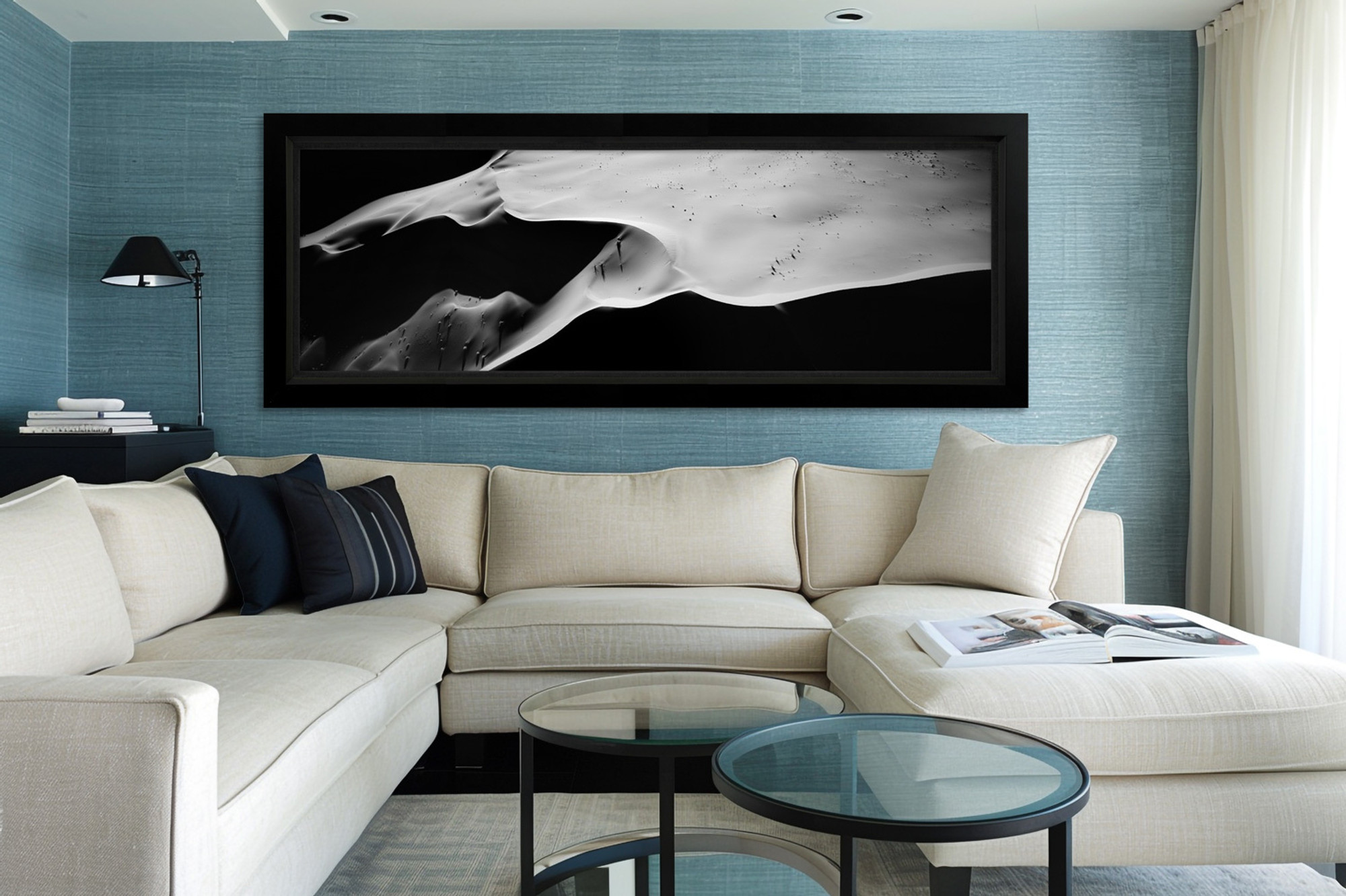 High Definition Metal Print of black and white dune landscape by Thomas Mangelsen. This large artwork for sale is displayed as living room wall art above a modern sectional.