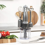 Gunmetal hand blender set with whisk, chopper and beaker attachments on kitchen counter