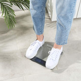 Black digital bathroom scale with glass platform, showing 0.0 kg on display