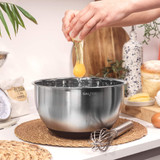 Silver stainless steel mixing bowl with black base, showing Salter branding