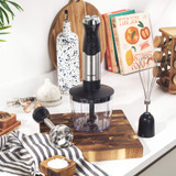 Black and silver hand blender set with chopping bowl, whisk, and beaker