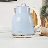 Blue electric kettle with cream handle on kitchen counter