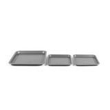 Set of three grey non-stick baking trays in different sizes, shown on white background