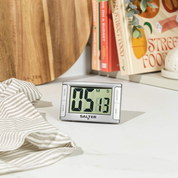 Silver digital kitchen timer with large display, rectangular, Salter brand.