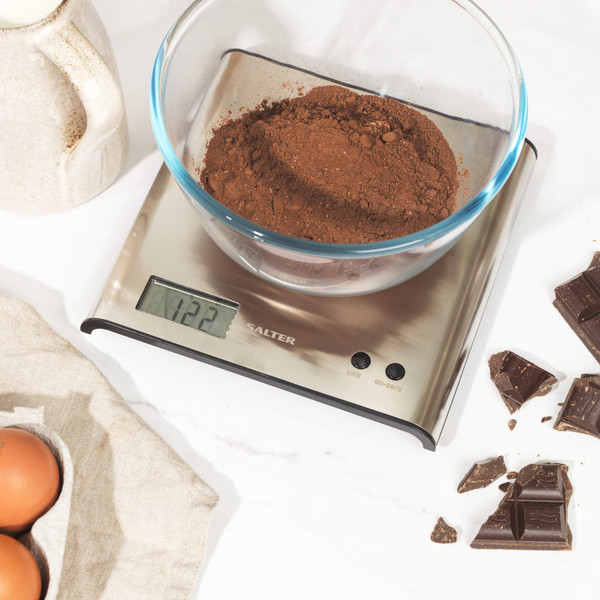 Square silver digital kitchen scale with LCD display, showing 180 grams.