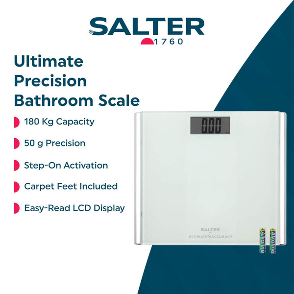 Glass digital bathroom scale with large display on tiled floor