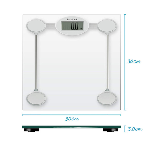 Person stepping onto glass digital bathroom scale