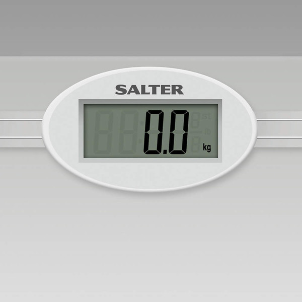 Glass digital bathroom scale with silver accents, showing 0.0kg on display