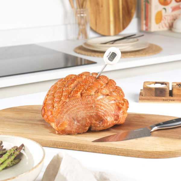 Digital cooking thermometer with white casing, showing 24°C on display