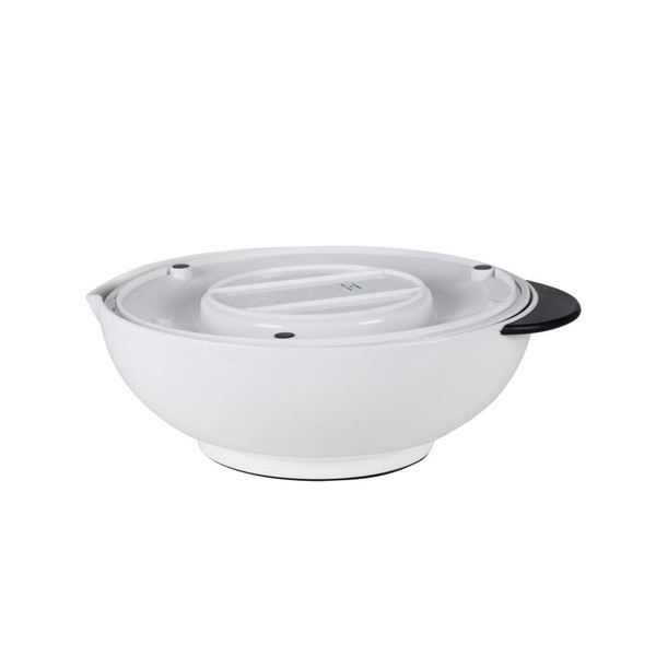 White plastic salad spinner with black handle, side view