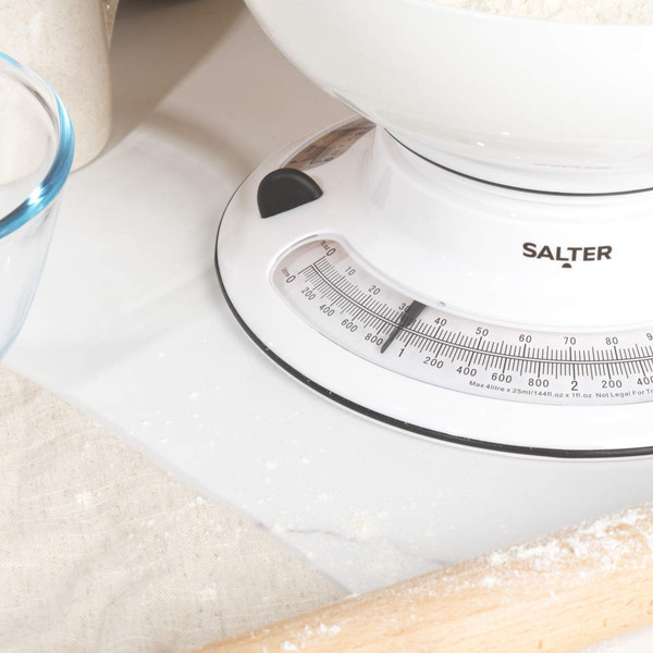 White mechanical kitchen scale with large bowl, Salter brand, 25.6cm wide by 25.4cm tall.