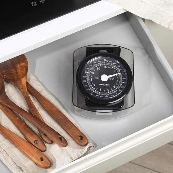 Box of Salter mechanical kitchen scales, black, 5kg capacity, 15-year guarantee.