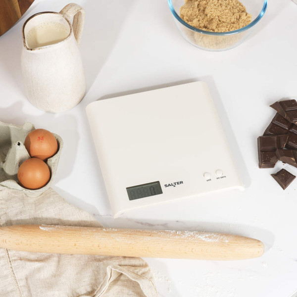 White digital kitchen scale with LCD display, showing Salter brand.