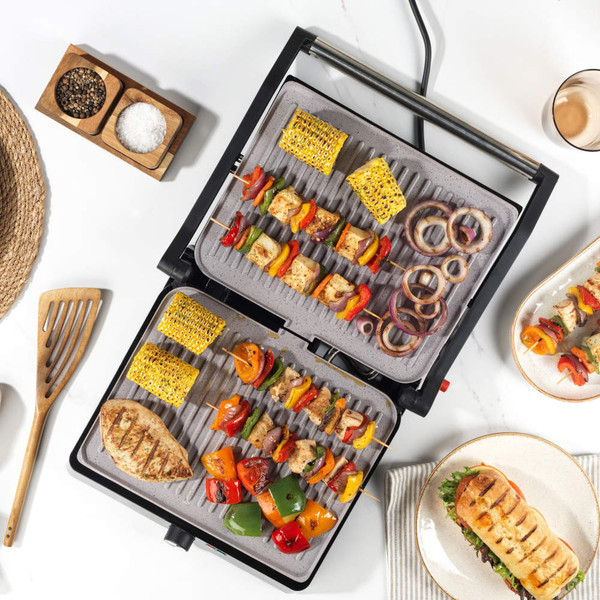 Black Salter contact grill with non-stick plates, temperature dial and power lights, closed position