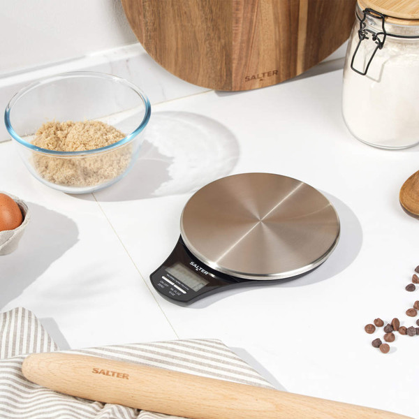 Salter digital kitchen scale with stainless steel platform on white worktop