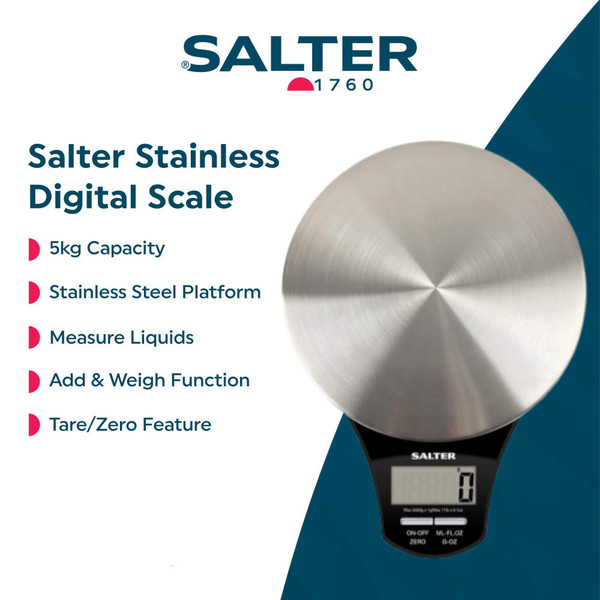 Glass bowl of milk on Salter digital kitchen scale, baking ingredients nearby