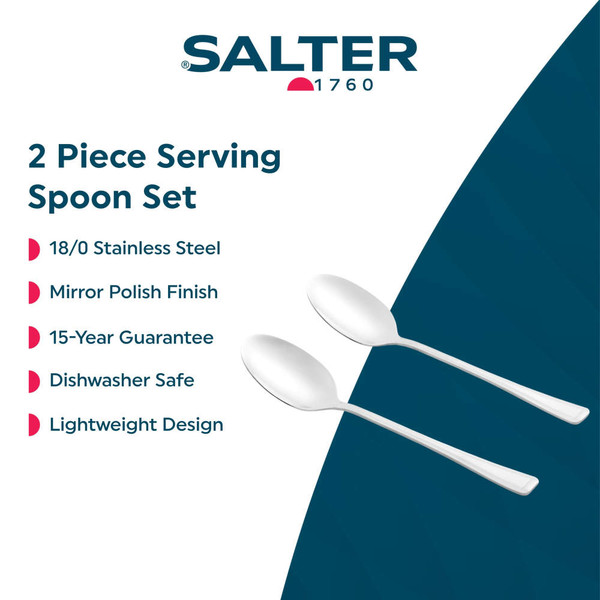 Set of two stainless steel dessert spoons on woven placemat with bowl