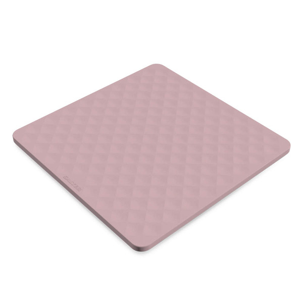 Large pink chopping board with textured surface, shown angled for detail.