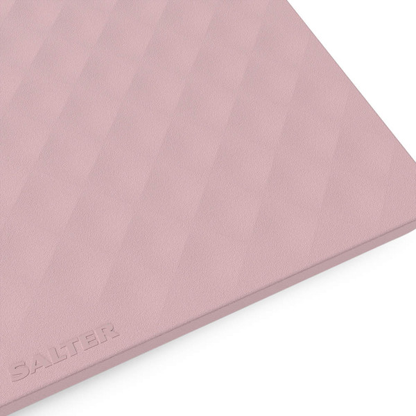 Pink textured chopping board corner with subtle 'Salter' branding