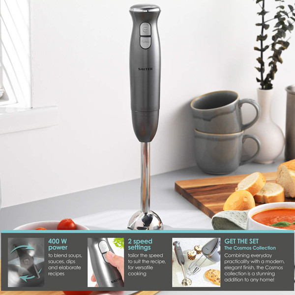Salter gunmetal hand blender with two speed settings shown beside soup and bread