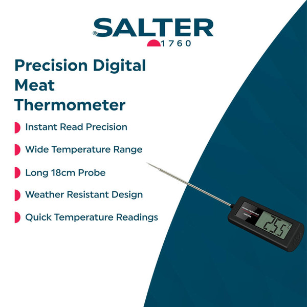 Digital meat thermometer checking doneness of roast beef on wooden board