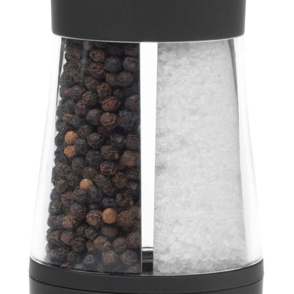Dual salt and pepper grinder with black top, filled with whole peppercorns and coarse salt