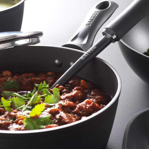 Non-stick saucepan with tomato stew, topped with fresh herbs, Salter branding on handle