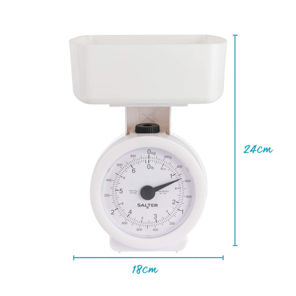 White mechanical kitchen scale with bowl, shown front view. 2kg max. Dimensions: 24cm high, 18cm wide.