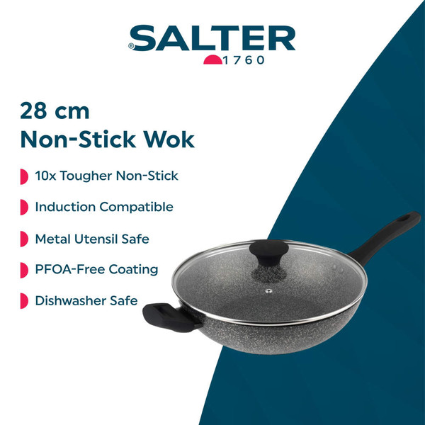 Black and white speckled non-stick cookware set including saucepans and frying pans on a kitchen counter.